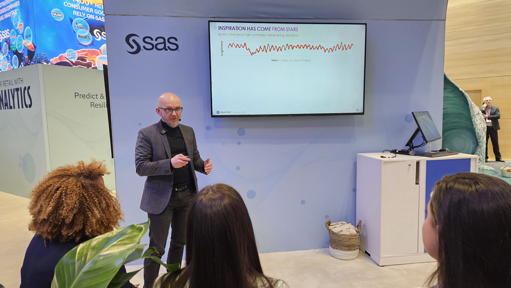 Arkadiusz Wisniewski presenting at the SAS Booth at NRF24 Retail's Big Show in New York, AI, BI, Cloud management, MLOps, AI staff augmentation services, data strategy, consulting services, Retail, Supply Chain,